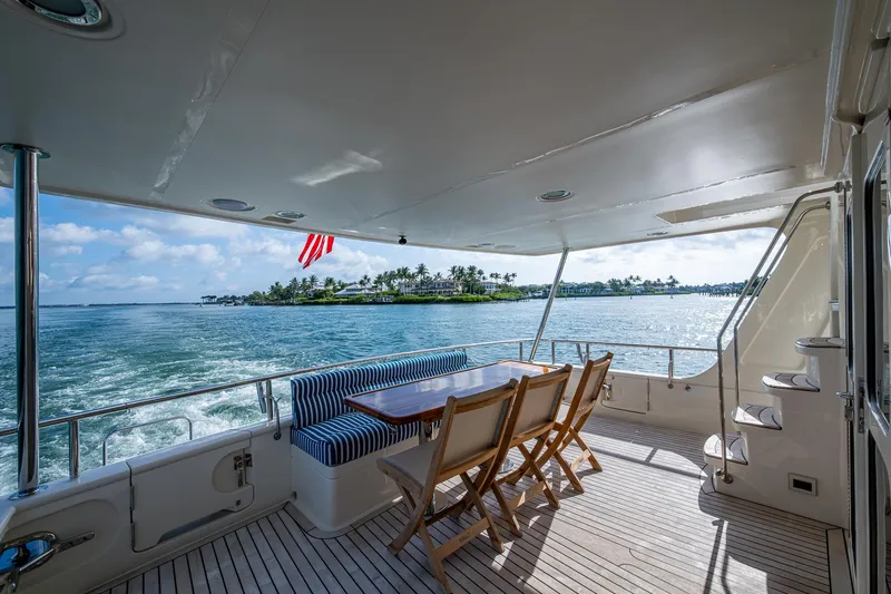 Cara Mia Yacht Photos Pics Outdoor seating area on 2021 Marlow 53E Explorer yacht with ocean view.