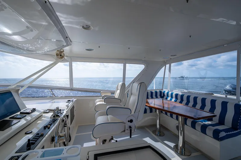 Cara Mia Yacht Photos Pics Interior of 2021 Marlow 53E Explorer yacht with seating and ocean view.