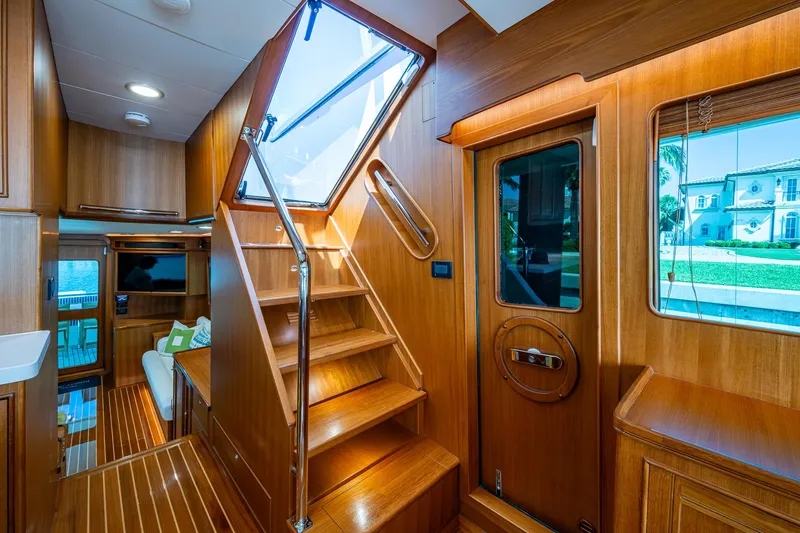 Cara Mia Yacht Photos Pics Interior of 2021 Marlow 53E Explorer yacht with wooden stairs and modern design.
