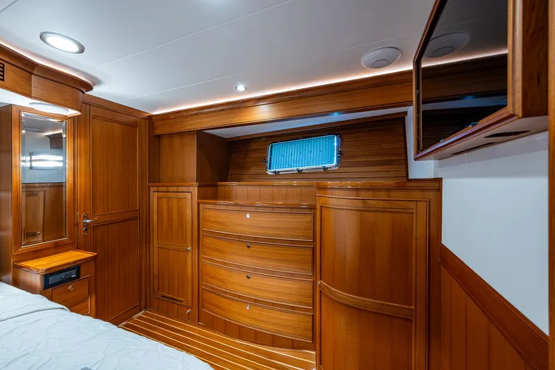 Cara Mia Yacht Photos Pics Luxurious wooden interior of 2021 Marlow 53E Explorer yacht cabin.