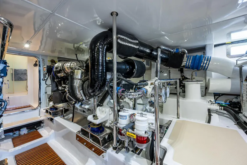 Cara Mia Yacht Photos Pics Engine room of 2021 Marlow 53E Explorer yacht, showcasing advanced machinery and equipment.