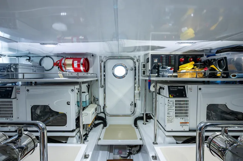 Cara Mia Yacht Photos Pics Engine room of 2021 Marlow 53E Explorer yacht with equipment and safety gear.