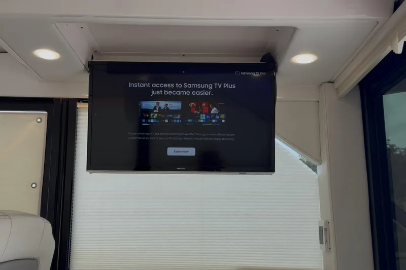 Monet Yacht Photos Pics Flat-screen TV displaying Samsung TV Plus in a 2021 Regal 36 XO yacht interior.