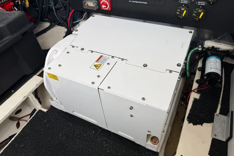 Monet Yacht Photos Pics Engine compartment of 2021 Regal 36 XO boat with electrical components and wiring.