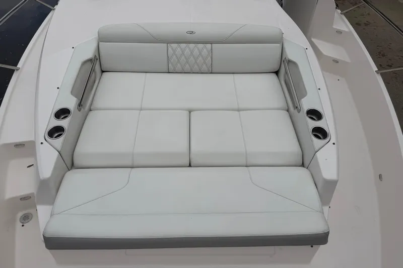 Monet Yacht Photos Pics Luxurious seating on 2021 Regal 36 XO boat with cup holders and elegant design.