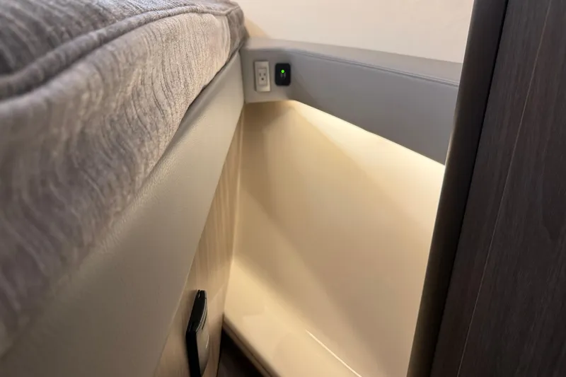 Monet Yacht Photos Pics Interior of 2021 Regal 36 XO boat with modern lighting and power outlet.