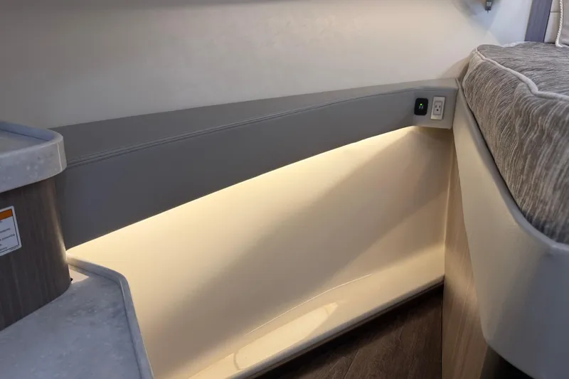 Monet Yacht Photos Pics Interior view of 2021 Regal 36 XO boat with ambient lighting and modern design.