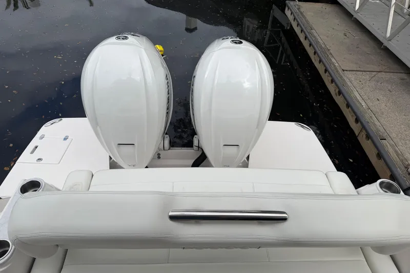 Monet Yacht Photos Pics 2021 Regal 36 XO boat with dual outboard engines at dockside.