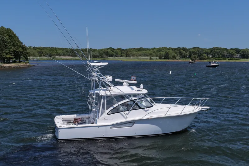 Salty Bear Yacht Photos Pics 2022 Albemarle 360 Express Fisherman boat on a sunny day, cruising in a scenic waterway.