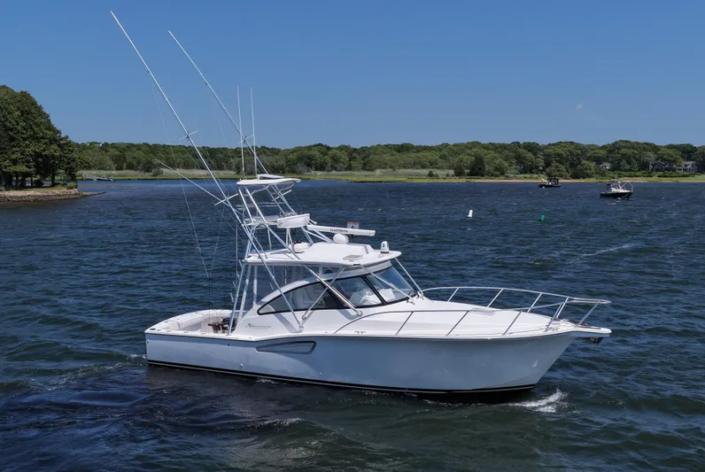 Salty Bear Yacht Photos Pics 2022 Albemarle 360 Express Fisherman boat on a scenic lake.