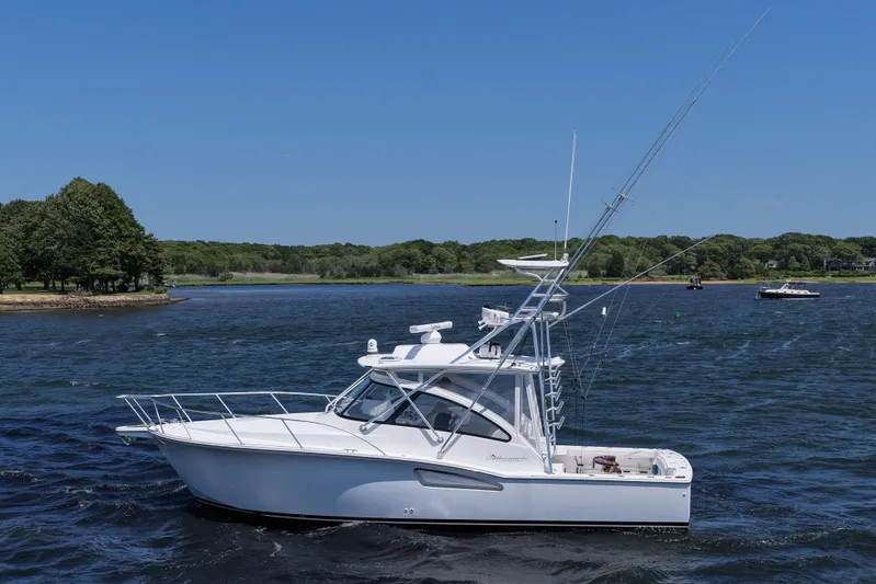 Salty Bear Yacht Photos Pics 2022 Albemarle 360 Express Fisherman boat on a scenic lake.