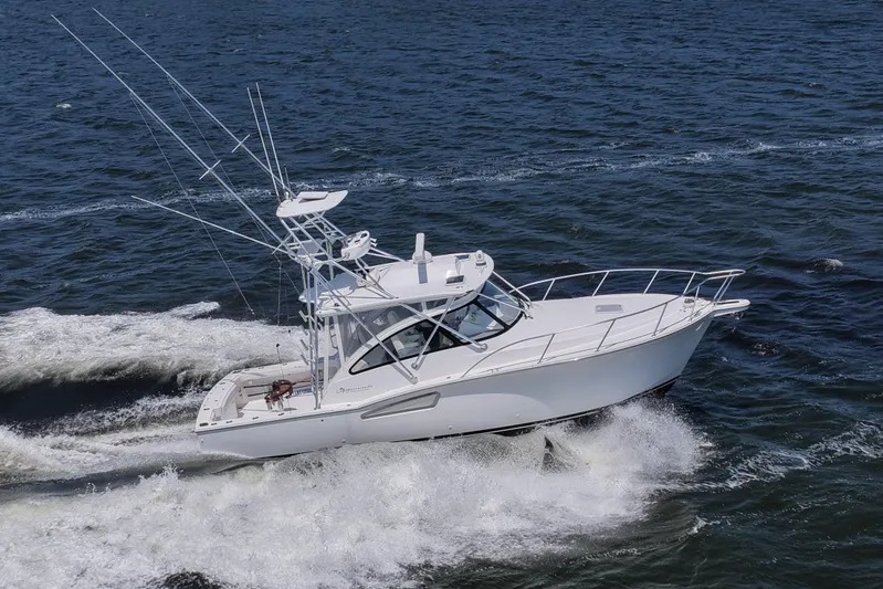 Salty Bear Yacht Photos Pics 2022 Albemarle 360 Express Fisherman cruising on open water, showcasing sleek design and performance.
