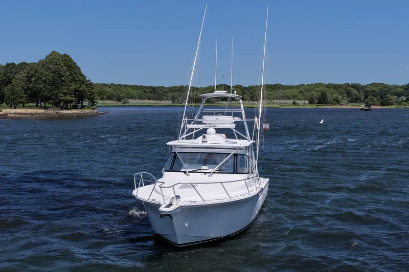Salty Bear Yacht Photos Pics 2022 Albemarle 360 Express Fisherman boat cruising on a scenic lake.