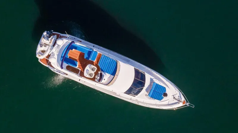  Yacht Photos Pics Aerial view of 2010 Sunseeker Manhattan 60 yacht on calm water.
