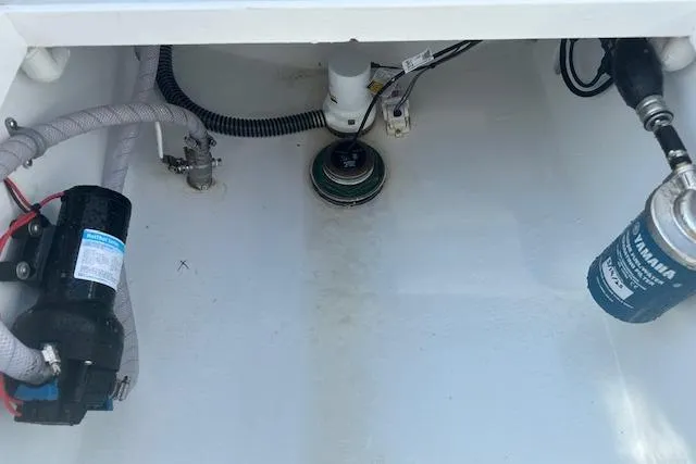  Yacht Photos Pics Bilge area of 2025 Custom Carolina Forbes boat with visible hoses and components.