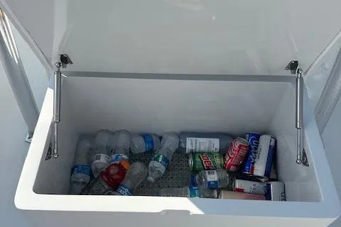  Yacht Photos Pics Open cooler on Custom Carolina Forbes 2025 boat with assorted drinks inside.