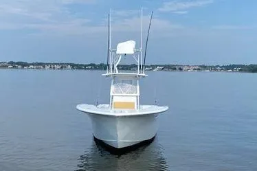  Yacht Photos Pics Custom Carolina Forbes 2025 boat on calm water under a clear sky.