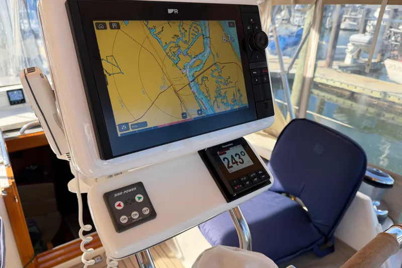 Sirius Yacht Photos Pics Navigation system on 2011 Passport 470 Center Cockpit sailboat, displaying nautical chart.