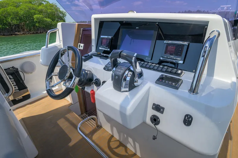  Yacht Photos Pics Control panel of a 2018 Fjord 36 Xpress boat with modern navigation equipment.