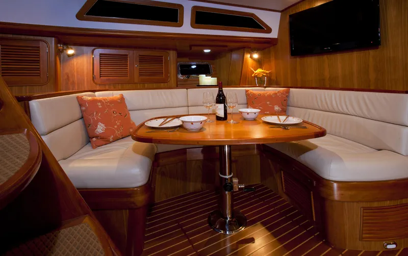 Sirius Yacht Photos Pics Interior of 2011 Passport 470 Center Cockpit yacht with elegant dining area.