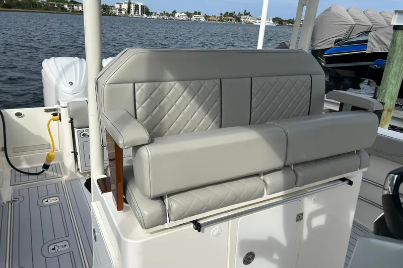  Yacht Photos Pics 2023 Pursuit S 288 Sport boat with luxurious quilted seating and sleek design.