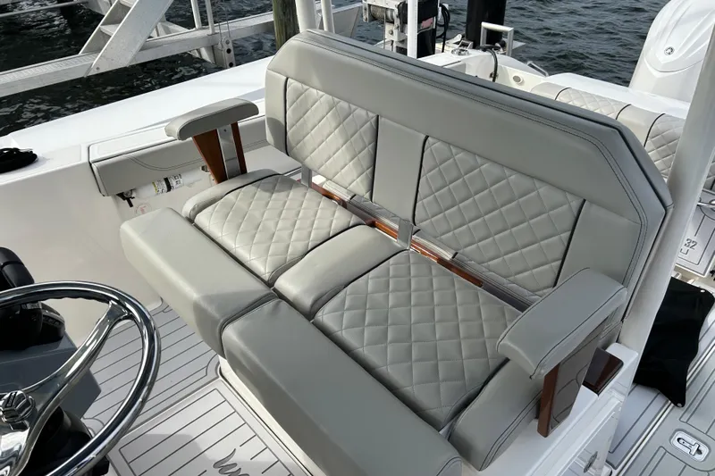  Yacht Photos Pics 2023 Pursuit S 288 Sport boat with luxurious quilted seating and sleek design.