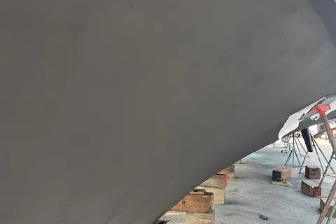 Island Yacht Photos Pics 1988 Hatteras 70 yacht hull on dry dock with support blocks.