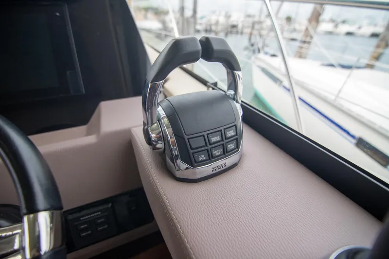 Hoff Yacht Photos Pics Throttle control panel of 2016 Regal 42 Grande Coupe yacht, featuring Volvo Penta controls.