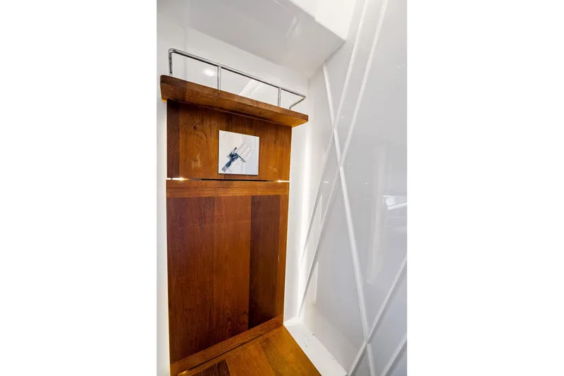 Hoff Yacht Photos Pics Wooden interior detail of a 2016 Regal 42 Grande Coupe yacht with modern design elements.