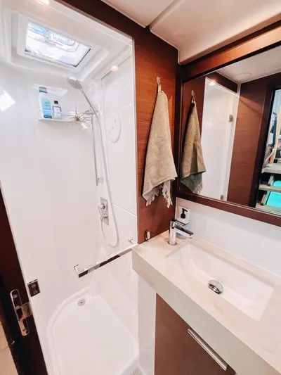 Cloud II Yacht Photos Pics Modern bathroom in 2023 Lagoon 40 yacht with shower and sink.