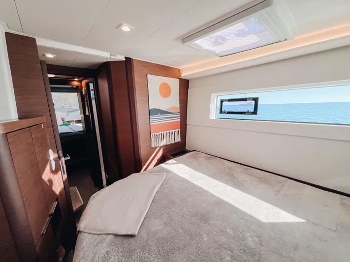 Cloud II Yacht Photos Pics Luxurious interior of 2023 Lagoon 40 yacht with ocean view and modern decor.