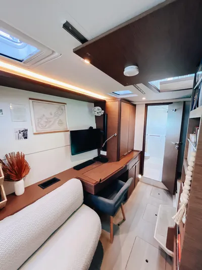 Cloud II Yacht Photos Pics Modern interior of 2023 Lagoon 40 yacht with cozy seating and sleek design.