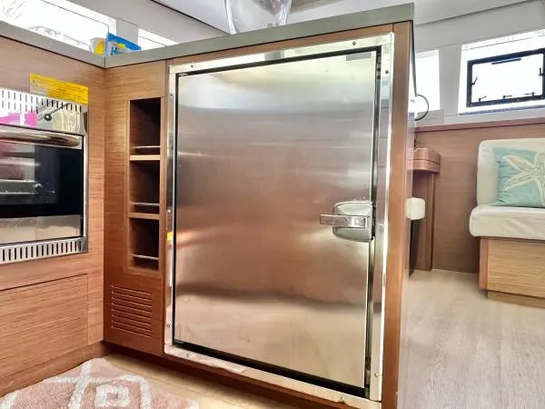 Smooth Sailor Yacht Photos Pics Stainless steel fridge in 2019 Lagoon 450 yacht interior kitchen.
