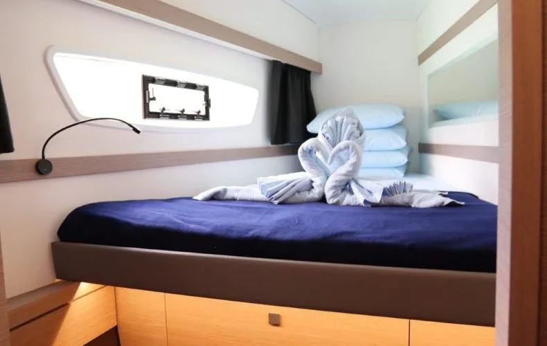 Wish You Were Here Yacht Photos Pics Interior of Fountaine Pajot Lucia 40 yacht, cozy cabin with bed.