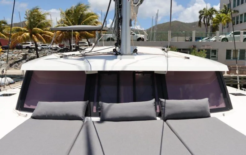 Wish You Were Here Yacht Photos Pics Fountaine Pajot Lucia 40 catamaran, 2020 model, featuring sun deck and palm trees.