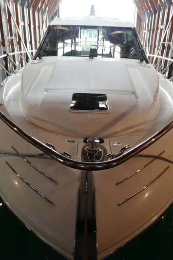 City Lights Yacht Photos Pics 2021 Maritimo X50 yacht in a boathouse, showcasing sleek design and modern features.