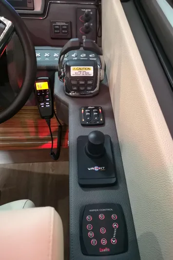 City Lights Yacht Photos Pics Control panel of a 2021 Maritimo X50 yacht with navigation and joystick controls.