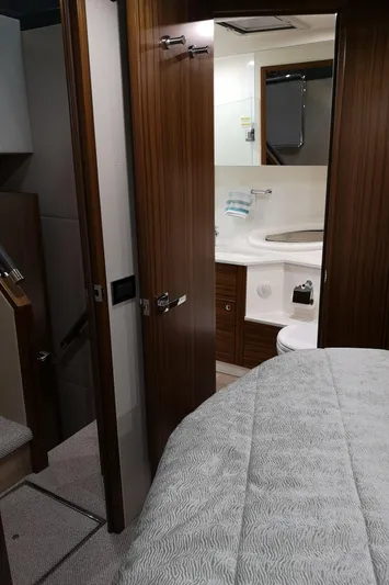 City Lights Yacht Photos Pics 2021 Maritimo X50 yacht interior with bedroom and bathroom view.
