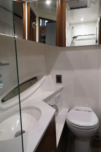 City Lights Yacht Photos Pics Luxurious bathroom in 2021 Maritimo X50 yacht with modern fixtures and sleek design.
