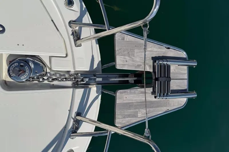  Yacht Photos Pics 2024 Jeanneau Merry Fisher 1095 Fly bow with anchor and stainless steel fittings.
