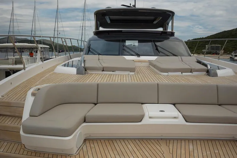  Yacht Photos Pics Luxurious 2025 Princess Y95 yacht with spacious deck and elegant seating area.
