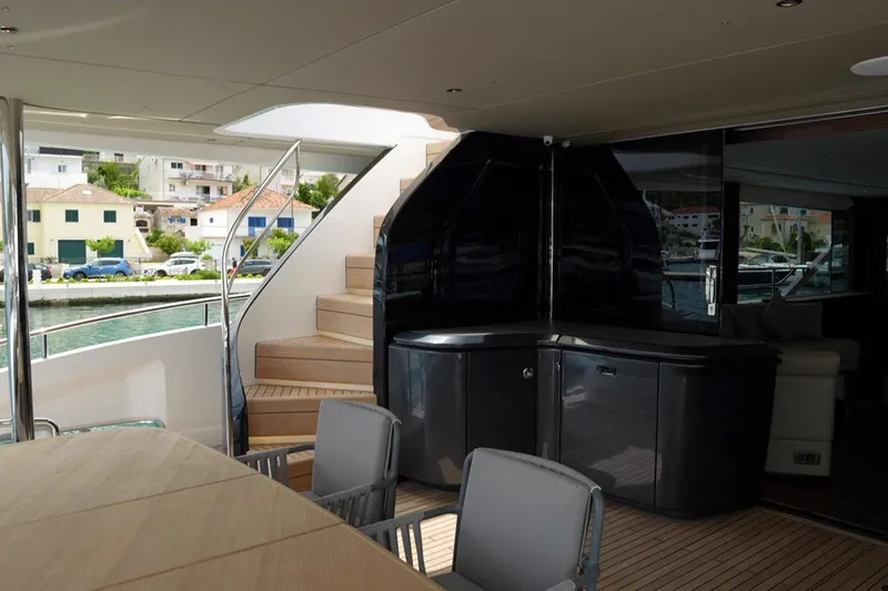  Yacht Photos Pics Luxurious 2025 Princess Y95 yacht interior with elegant seating and modern design.
