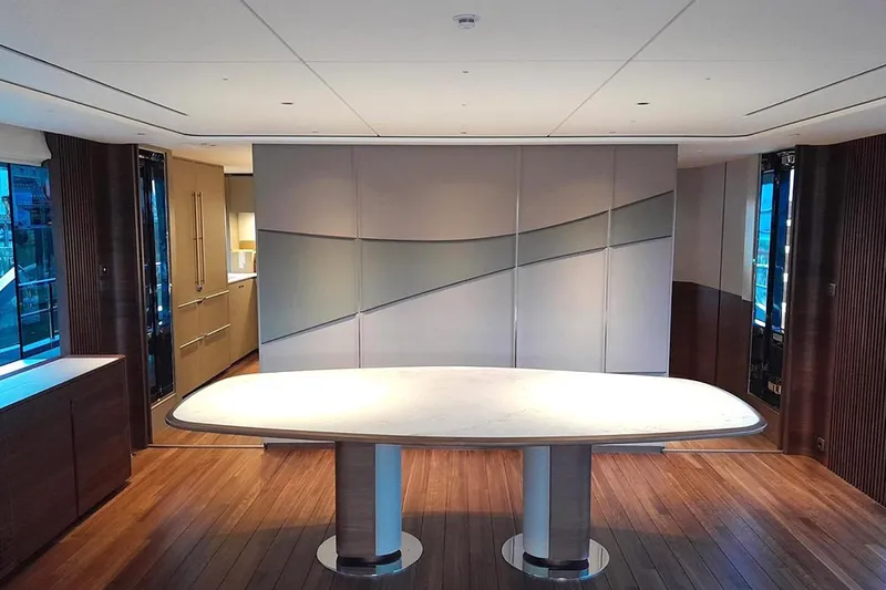  Yacht Photos Pics Luxurious interior of 2025 Princess Y95 yacht with modern dining area and elegant design.