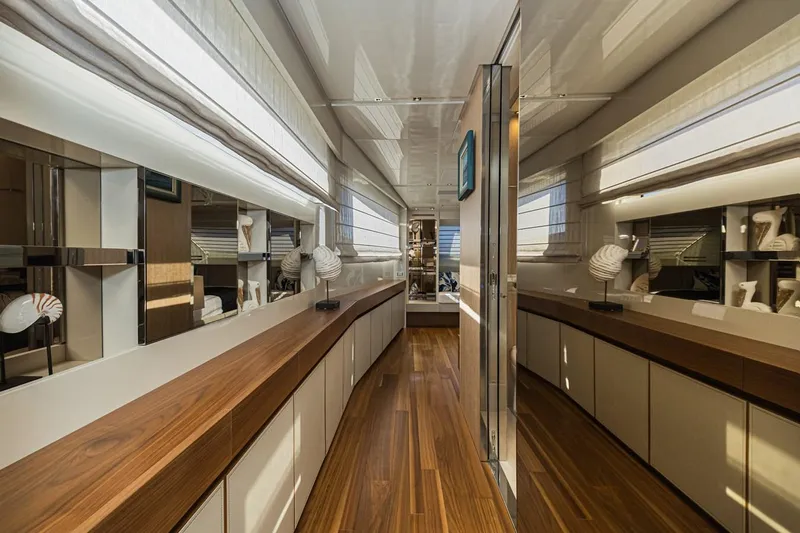 Percal Yacht Photos Pics Luxurious interior of 2014 Sanlorenzo SL104-586 yacht with elegant wood flooring and modern decor.