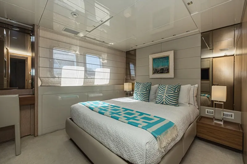 Percal Yacht Photos Pics Luxurious bedroom interior on 2014 Sanlorenzo SL104-586 yacht with modern decor and large windows.