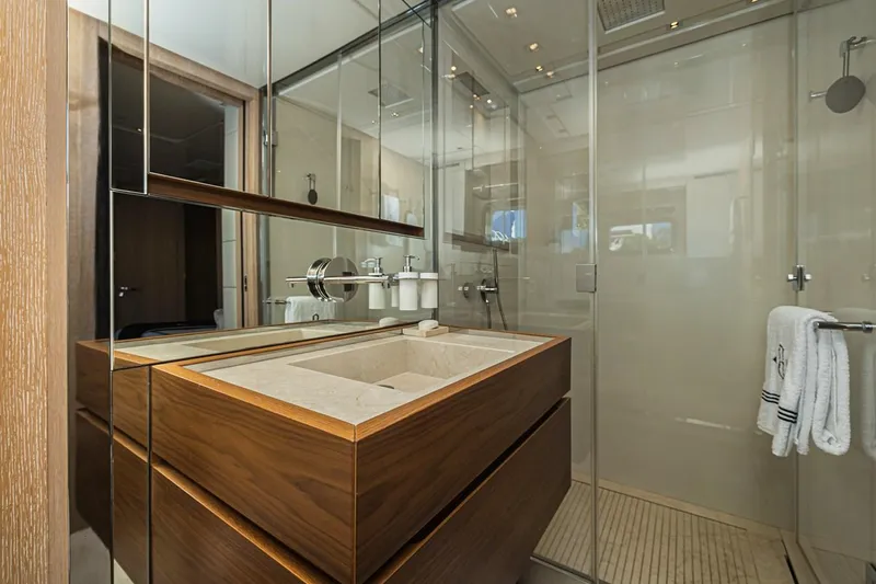 Percal Yacht Photos Pics Luxurious bathroom in 2014 Sanlorenzo SL104-586 yacht with modern wood and glass design.