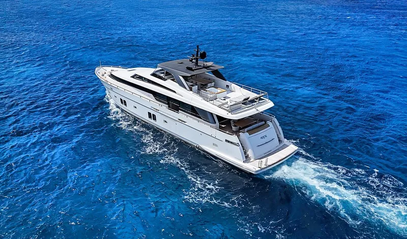 Percal Yacht Photos Pics Luxurious 2014 Sanlorenzo SL104-586 yacht cruising on vibrant blue ocean waters.