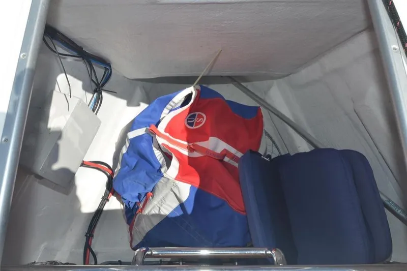 Leah Yacht Photos Pics Storage compartment of 2014 Jeanneau Sun Odyssey 469 with colorful sail and equipment.