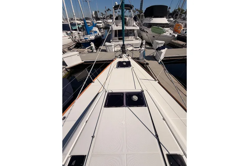 Leah Yacht Photos Pics 2014 Jeanneau Sun Odyssey 469 sailboat docked at marina, view from deck.