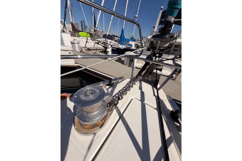 Leah Yacht Photos Pics 2014 Jeanneau Sun Odyssey 469 sailboat deck with anchor chain and winch.